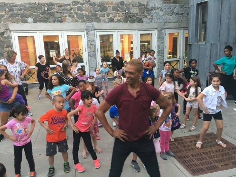 BWW-2017-Walter-Rutledge-768x576 Children dancing outside during performing arts workshop.