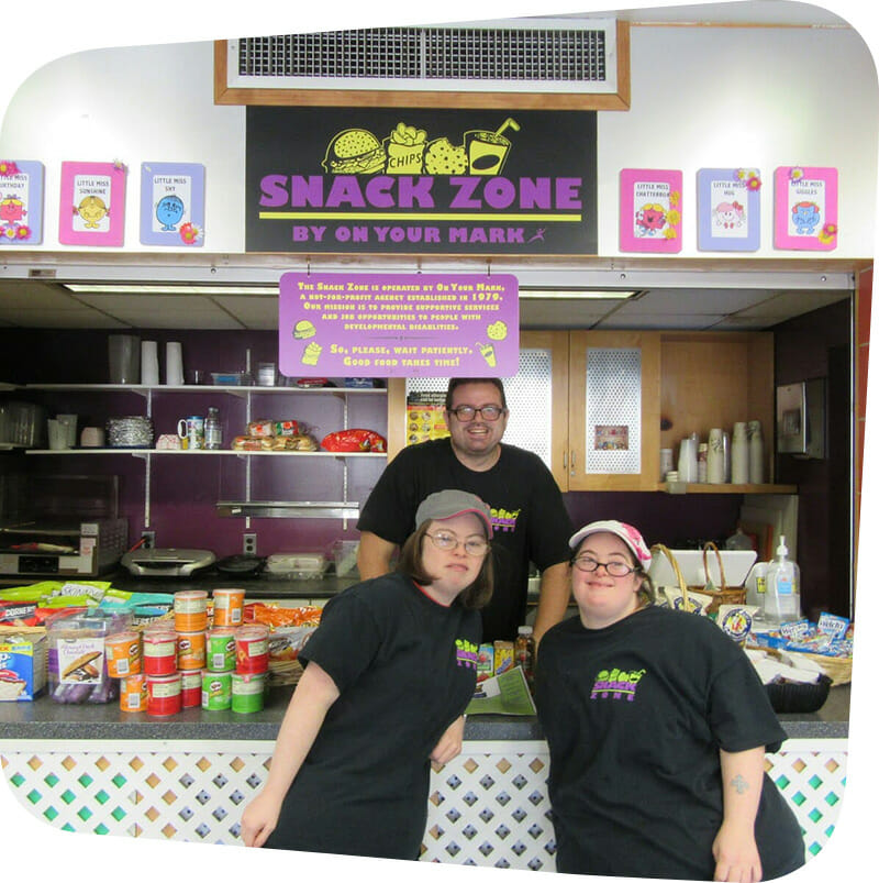 Snack Zone staff posing in front of Snack Zone.