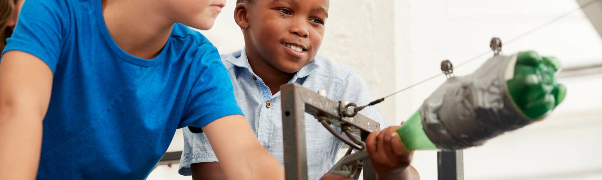 Children experimenting with bottle rocket