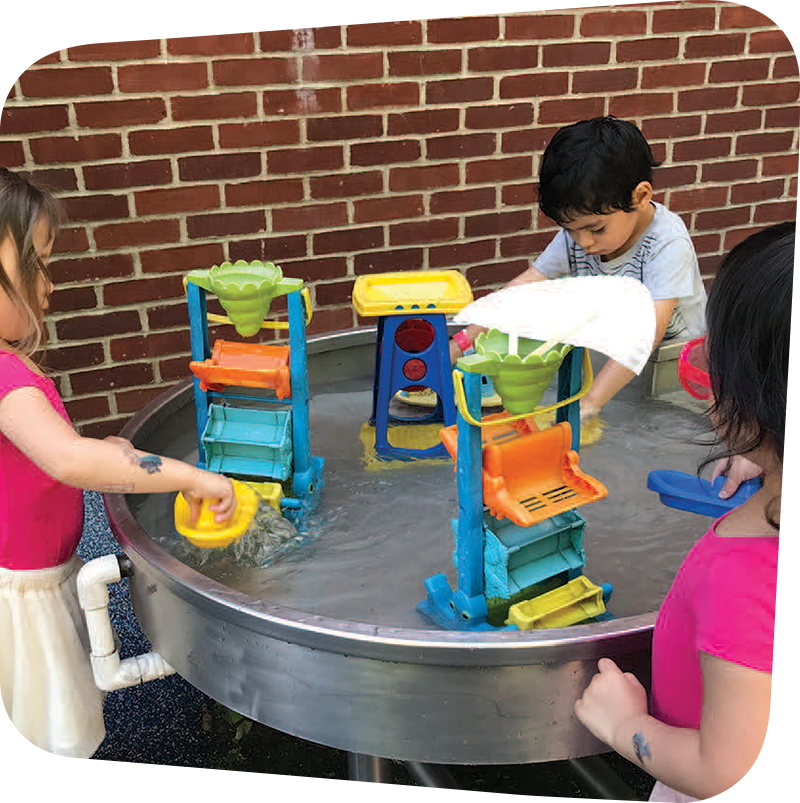 Children playing with water toys.