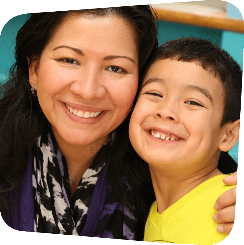 mother and son smiling