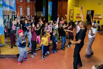 Walter leading kids in dance