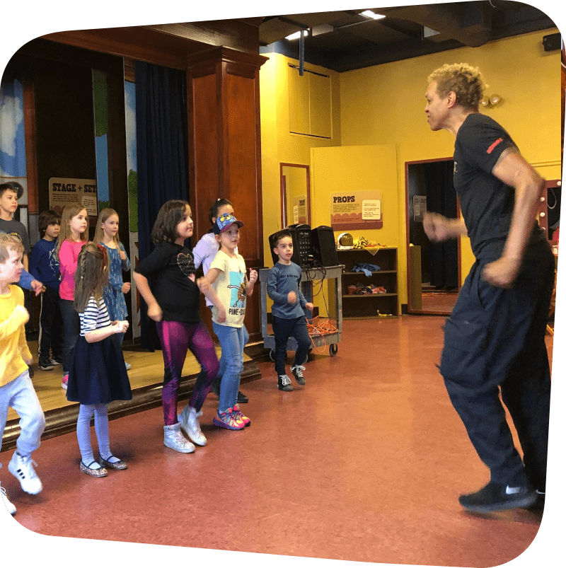 children following dancer instructors steps