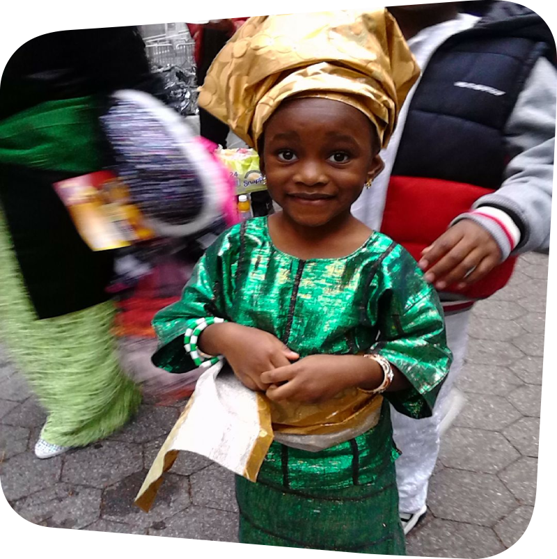 Girl wearing traditional Nigerian clothes at parade