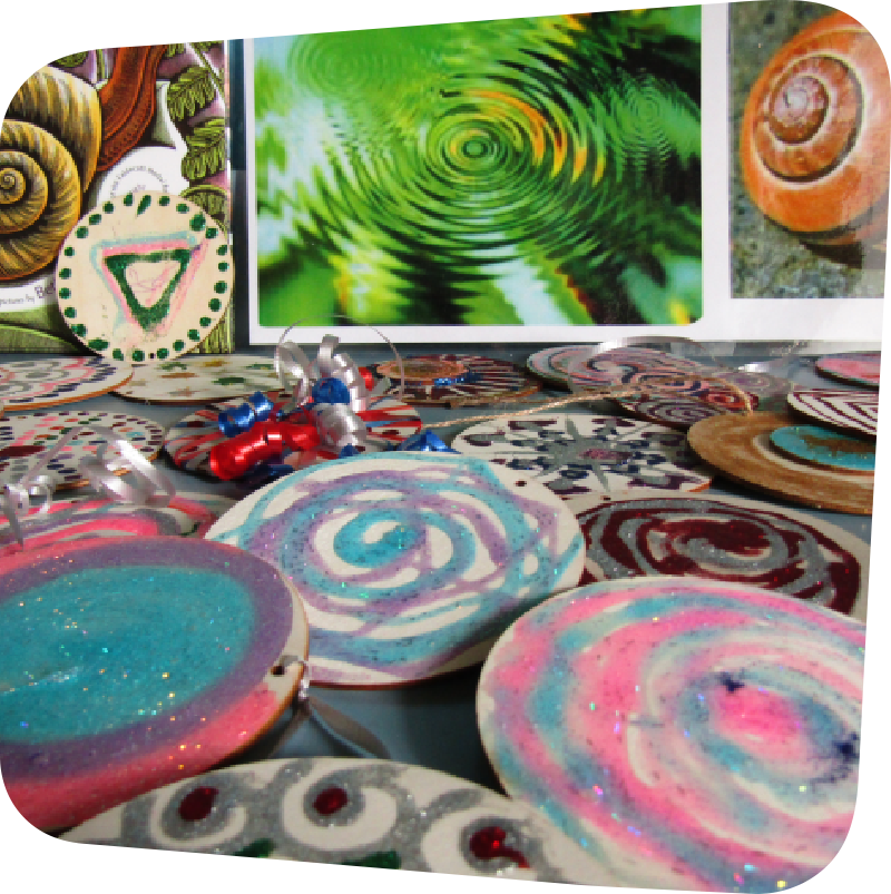 Pictures of examples of spirals in nature and art created by visitors inspired by nature
